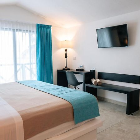Hotel Aldea 19 Bacalar Bagian luar foto