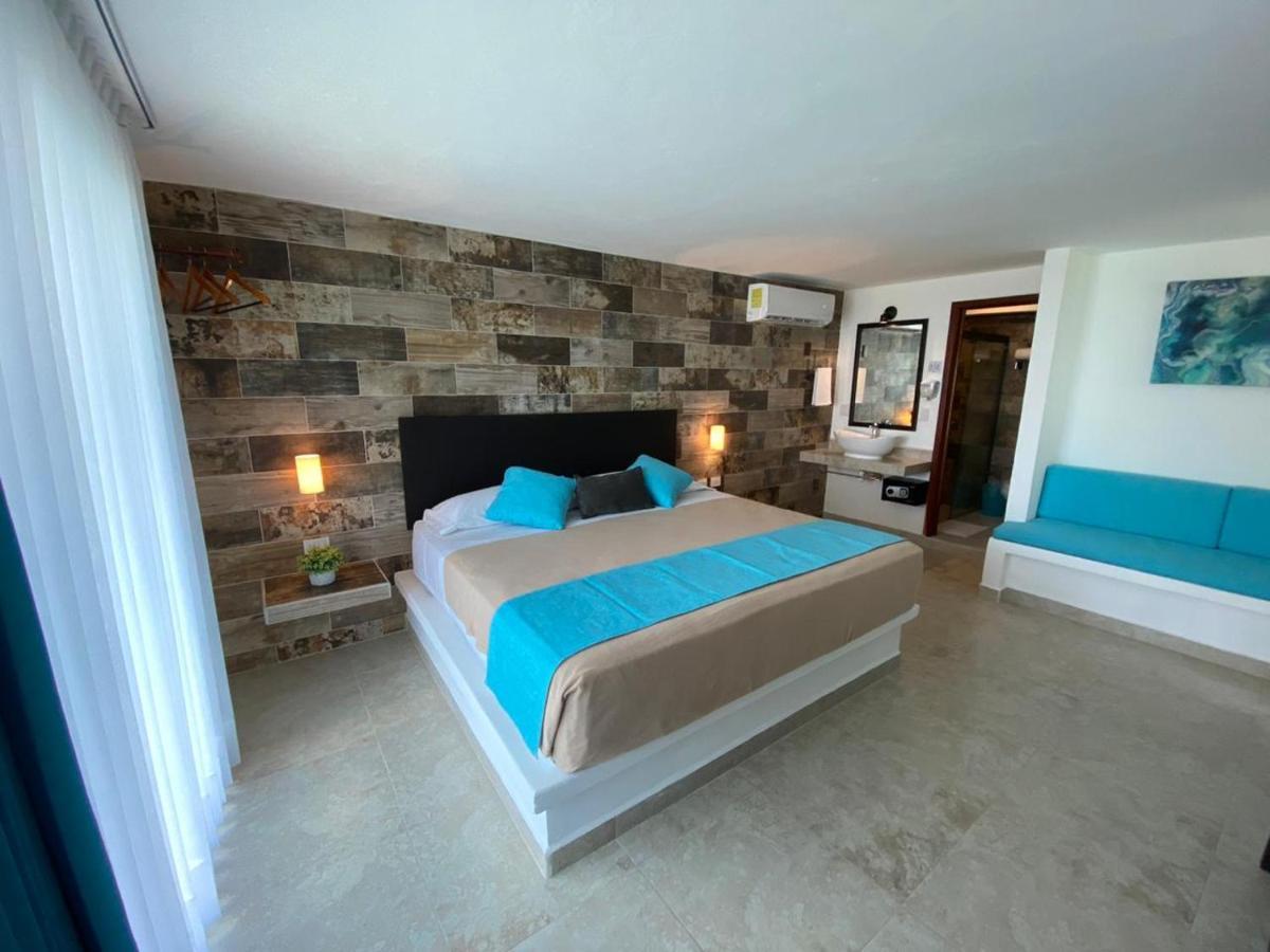Hotel Aldea 19 Bacalar Bagian luar foto